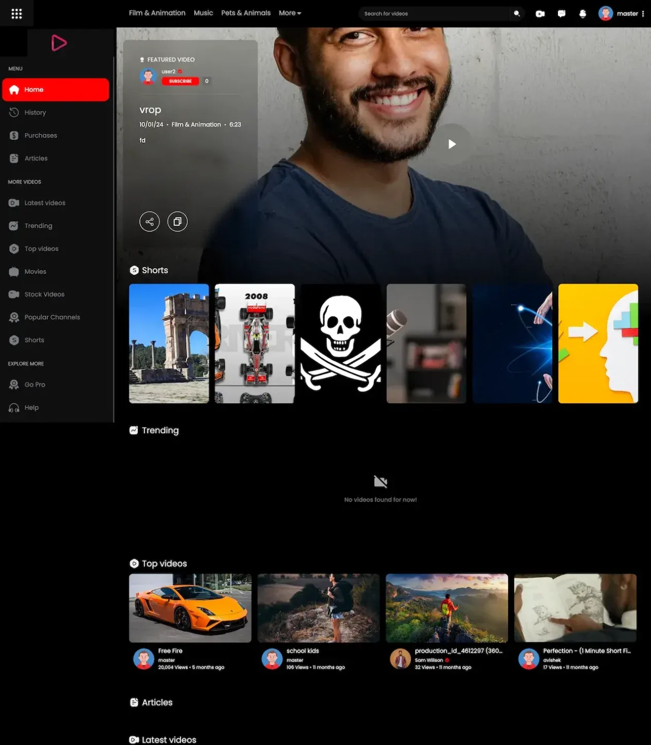 Dark web home with a side menu, a creator banner photo and rows of video thumbnails