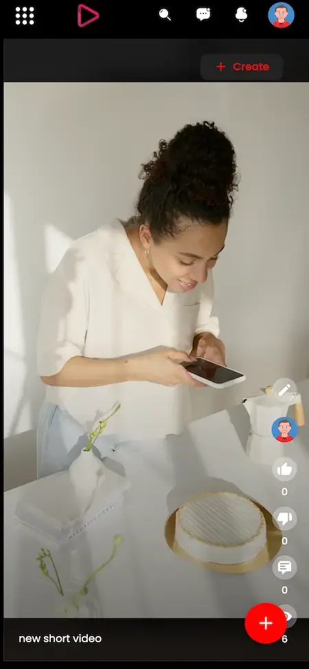 Phone short video recording screen with a vertical photo, a caption and a floating add button